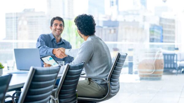 businessmen shake hands to close a deal