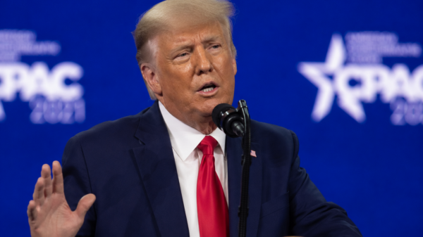 Donald Trump speaking at a conference