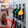 Pumps await a car for fueling at a gas and diesel station.