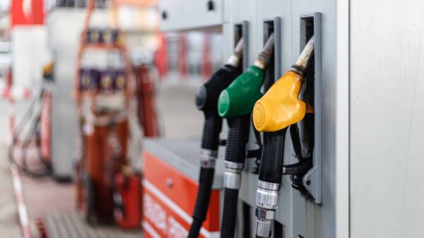 Pumps await a car for fueling at a gas and diesel station.