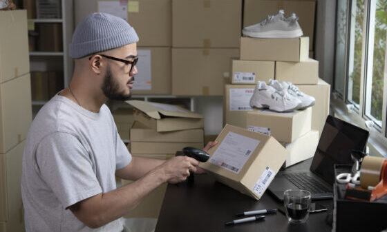 scanning a package shipping label for ecommerce delivery