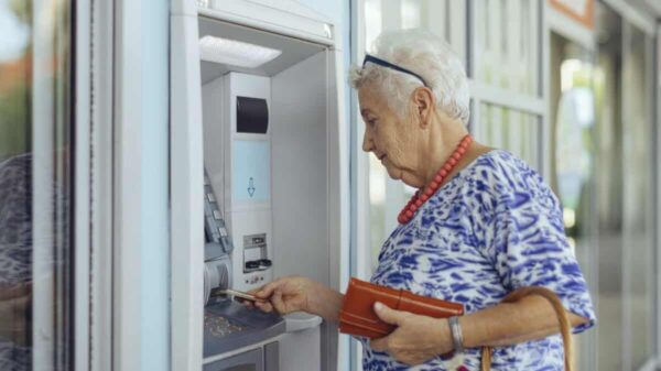 customer uses bank ATM
